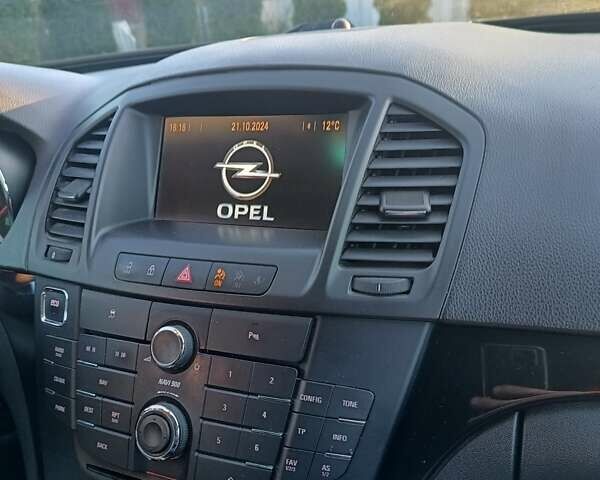 Серый Опель Инсигния, объемом двигателя 1.96 л и пробегом 316 тыс. км за 8600 $, фото 6 на Automoto.ua