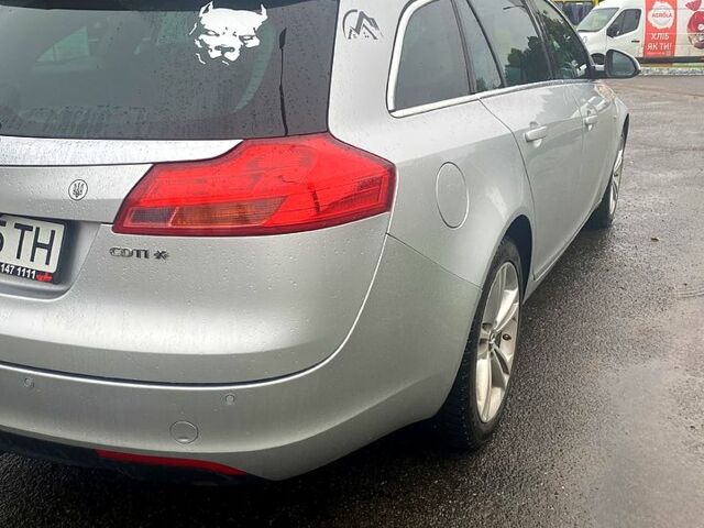 Сірий Опель Інсігнія, об'ємом двигуна 2 л та пробігом 34700 тис. км за 8200 $, фото 6 на Automoto.ua