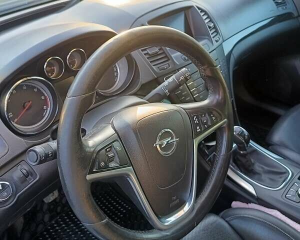 Серый Опель Инсигния, объемом двигателя 1.96 л и пробегом 316 тыс. км за 8600 $, фото 1 на Automoto.ua