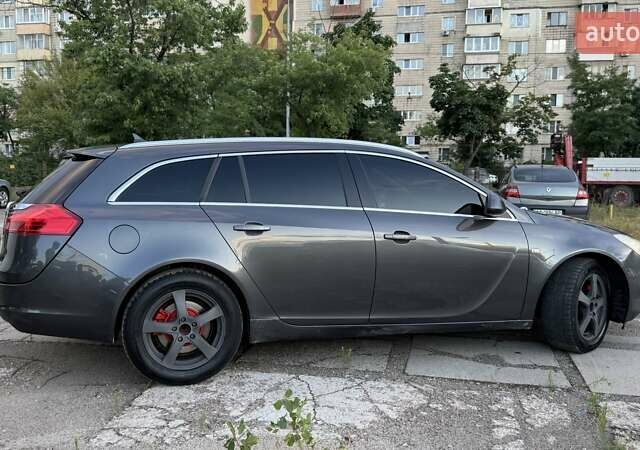 Сірий Опель Інсігнія, об'ємом двигуна 2 л та пробігом 288 тис. км за 7999 $, фото 3 на Automoto.ua