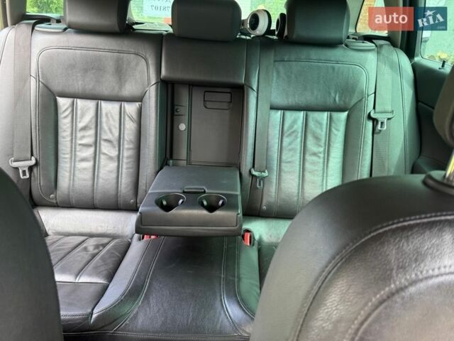 Серый Опель Инсигния, объемом двигателя 1.96 л и пробегом 301 тыс. км за 7000 $, фото 7 на Automoto.ua