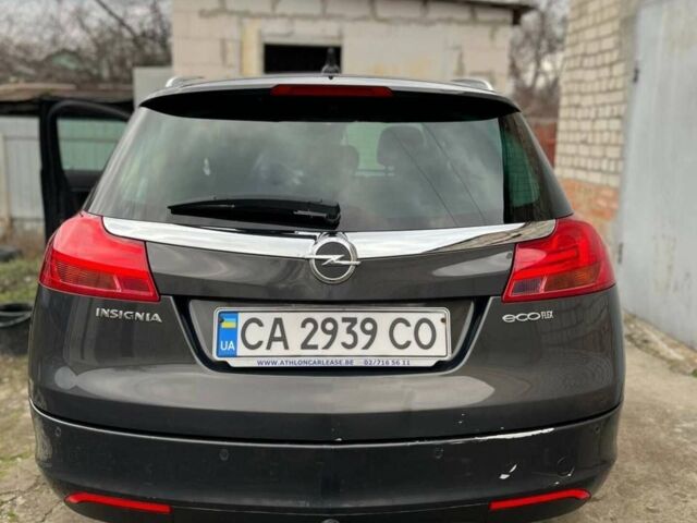 Сірий Опель Інсігнія, об'ємом двигуна 1.96 л та пробігом 250 тис. км за 7999 $, фото 1 на Automoto.ua