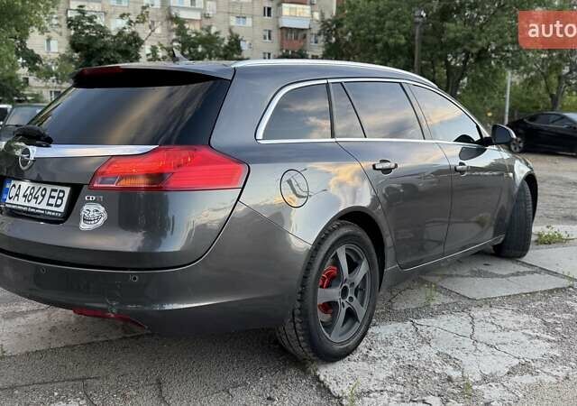Серый Опель Инсигния, объемом двигателя 1.96 л и пробегом 287 тыс. км за 8500 $, фото 6 на Automoto.ua