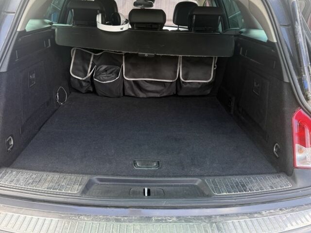 Серый Опель Инсигния, объемом двигателя 2 л и пробегом 301 тыс. км за 7000 $, фото 7 на Automoto.ua