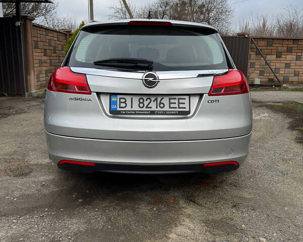 Серый Опель Инсигния, объемом двигателя 1.96 л и пробегом 234 тыс. км за 7700 $, фото 5 на Automoto.ua