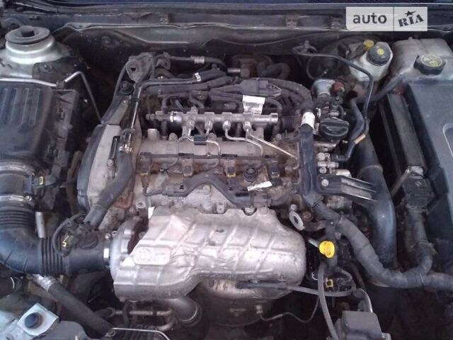 Серый Опель Инсигния, объемом двигателя 1.96 л и пробегом 370 тыс. км за 9000 $, фото 12 на Automoto.ua