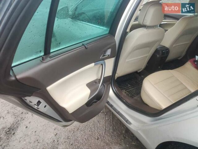 Серый Опель Инсигния, объемом двигателя 1.96 л и пробегом 256 тыс. км за 8300 $, фото 4 на Automoto.ua