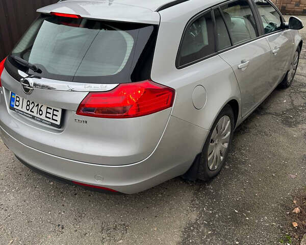 Серый Опель Инсигния, объемом двигателя 1.96 л и пробегом 234 тыс. км за 7700 $, фото 3 на Automoto.ua