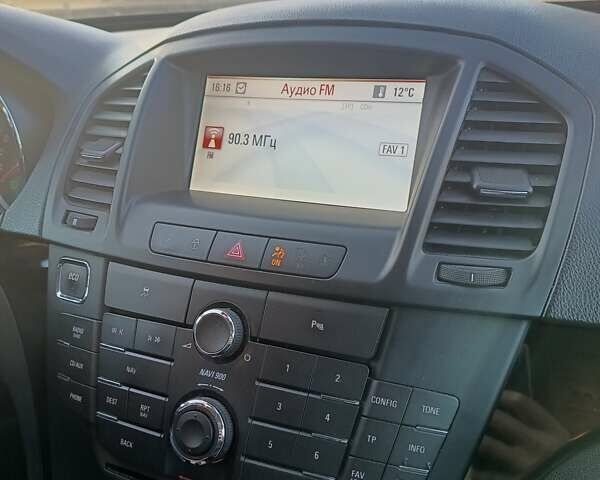 Серый Опель Инсигния, объемом двигателя 1.96 л и пробегом 316 тыс. км за 8600 $, фото 2 на Automoto.ua