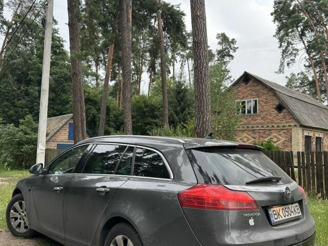 Сірий Опель Інсігнія, об'ємом двигуна 2 л та пробігом 250 тис. км за 7671 $, фото 2 на Automoto.ua