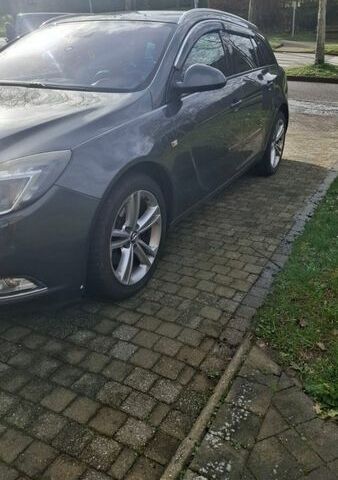 Серый Опель Инсигния, объемом двигателя 1.96 л и пробегом 324 тыс. км за 9000 $, фото 5 на Automoto.ua