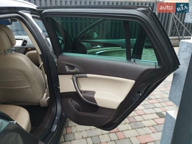 Серый Опель Инсигния, объемом двигателя 2 л и пробегом 293 тыс. км за 9500 $, фото 4 на Automoto.ua