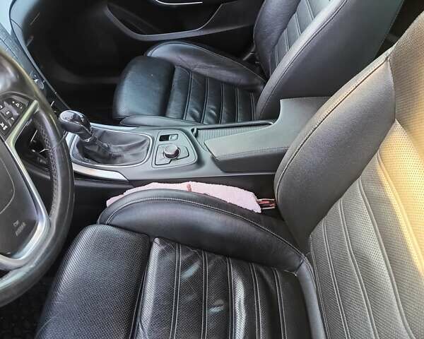 Серый Опель Инсигния, объемом двигателя 1.96 л и пробегом 316 тыс. км за 8600 $, фото 4 на Automoto.ua