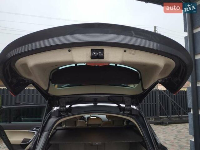 Серый Опель Инсигния, объемом двигателя 2 л и пробегом 293 тыс. км за 9500 $, фото 7 на Automoto.ua