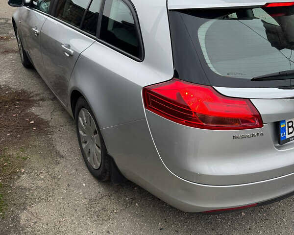 Серый Опель Инсигния, объемом двигателя 1.96 л и пробегом 234 тыс. км за 7700 $, фото 2 на Automoto.ua