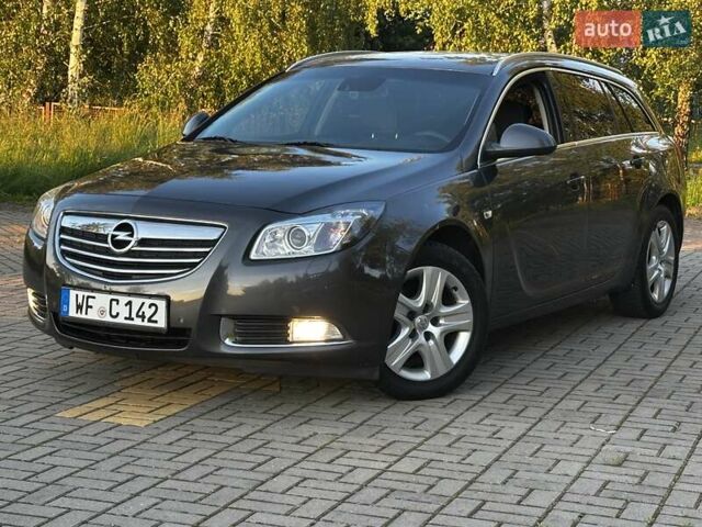 Сірий Опель Інсігнія, об'ємом двигуна 1.96 л та пробігом 217 тис. км за 7950 $, фото 2 на Automoto.ua