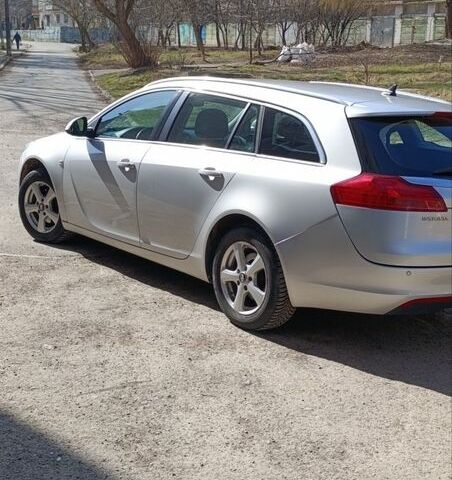 Серый Опель Инсигния, объемом двигателя 1.96 л и пробегом 227 тыс. км за 8200 $, фото 5 на Automoto.ua