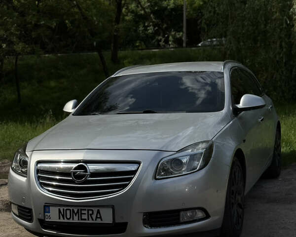 Серый Опель Инсигния, объемом двигателя 1.96 л и пробегом 233 тыс. км за 9500 $, фото 3 на Automoto.ua