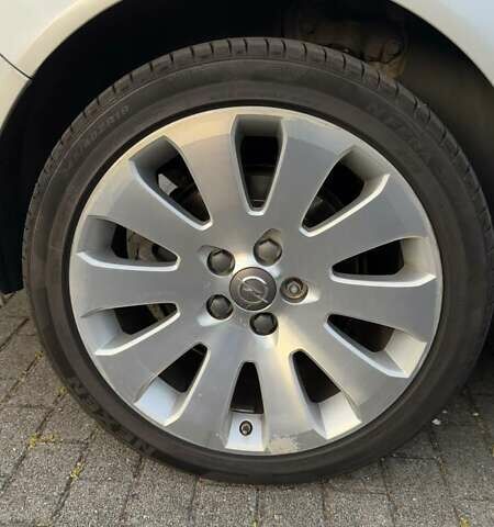 Сірий Опель Інсігнія, об'ємом двигуна 1.96 л та пробігом 239 тис. км за 9500 $, фото 23 на Automoto.ua