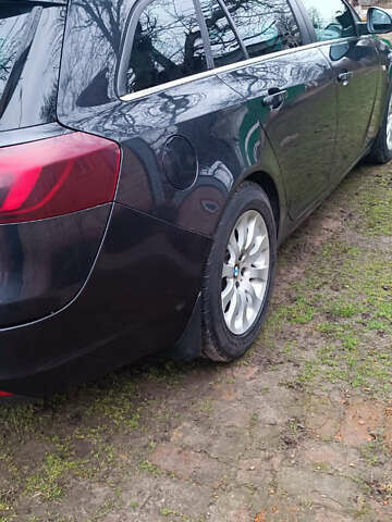 Серый Опель Инсигния, объемом двигателя 2 л и пробегом 235 тыс. км за 12200 $, фото 2 на Automoto.ua