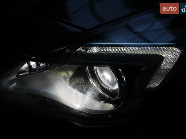 Сірий Опель Інсігнія, об'ємом двигуна 2 л та пробігом 225 тис. км за 10800 $, фото 7 на Automoto.ua