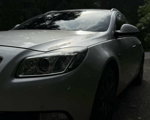 Серый Опель Инсигния, объемом двигателя 1.96 л и пробегом 233 тыс. км за 9500 $, фото 6 на Automoto.ua