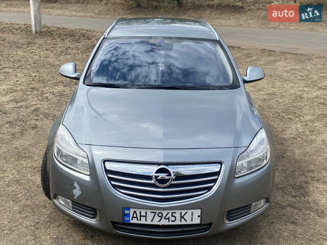 Серый Опель Инсигния, объемом двигателя 2 л и пробегом 338 тыс. км за 8100 $, фото 1 на Automoto.ua