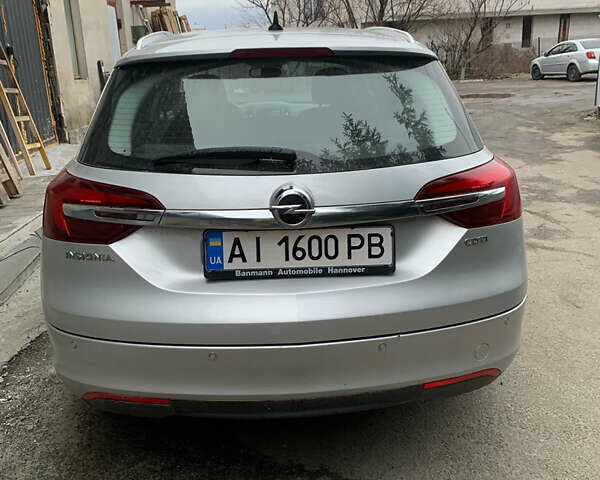 Серый Опель Инсигния, объемом двигателя 1.96 л и пробегом 239 тыс. км за 10000 $, фото 3 на Automoto.ua