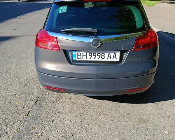 Серый Опель Инсигния, объемом двигателя 1.96 л и пробегом 267 тыс. км за 9300 $, фото 3 на Automoto.ua