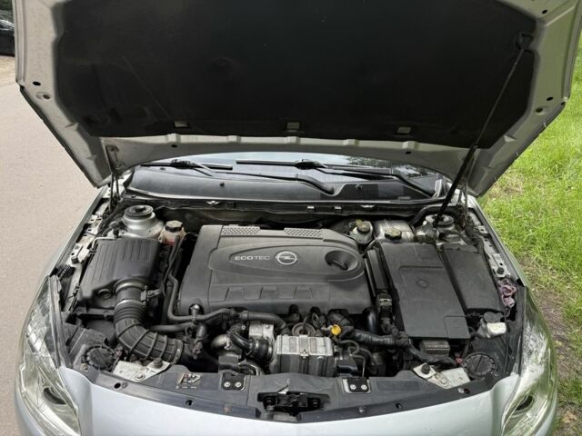 Серый Опель Инсигния, объемом двигателя 2 л и пробегом 234 тыс. км за 9500 $, фото 18 на Automoto.ua