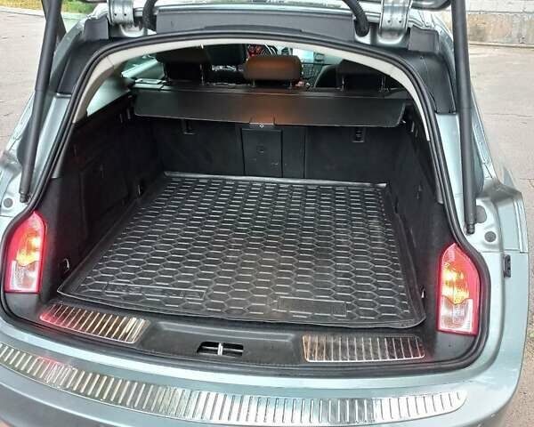 Серый Опель Инсигния, объемом двигателя 1.96 л и пробегом 300 тыс. км за 6300 $, фото 4 на Automoto.ua