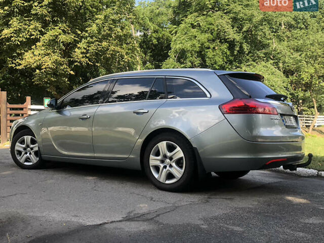 Серый Опель Инсигния, объемом двигателя 2 л и пробегом 174 тыс. км за 7800 $, фото 1 на Automoto.ua