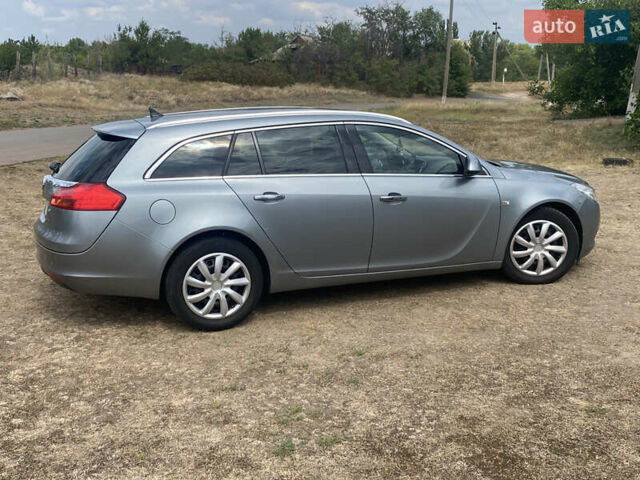 Серый Опель Инсигния, объемом двигателя 2 л и пробегом 338 тыс. км за 8100 $, фото 3 на Automoto.ua