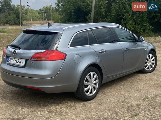 Серый Опель Инсигния, объемом двигателя 2 л и пробегом 338 тыс. км за 8100 $, фото 4 на Automoto.ua