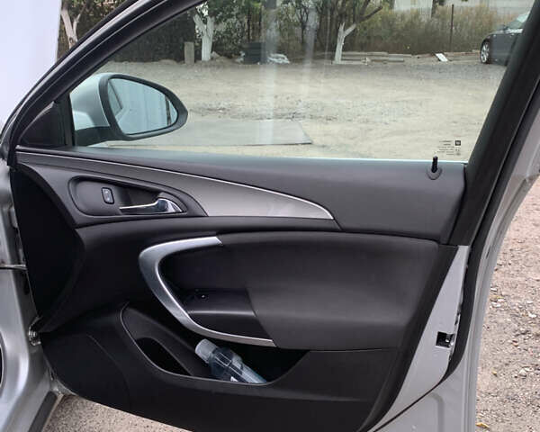 Серый Опель Инсигния, объемом двигателя 1.96 л и пробегом 239 тыс. км за 10000 $, фото 14 на Automoto.ua