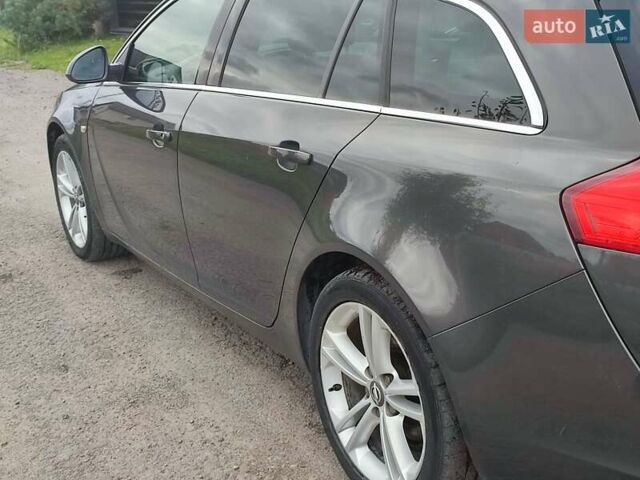 Серый Опель Инсигния, объемом двигателя 1.96 л и пробегом 214 тыс. км за 9200 $, фото 1 на Automoto.ua