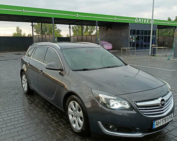 Серый Опель Инсигния, объемом двигателя 2 л и пробегом 283 тыс. км за 10500 $, фото 1 на Automoto.ua