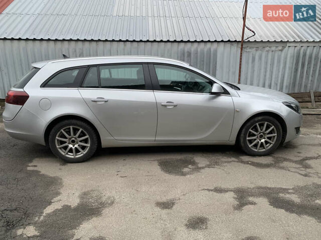 Серый Опель Инсигния, объемом двигателя 1.96 л и пробегом 239 тыс. км за 10000 $, фото 1 на Automoto.ua