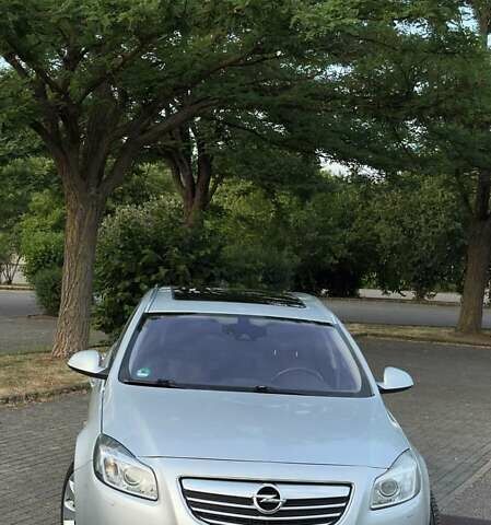 Сірий Опель Інсігнія, об'ємом двигуна 1.96 л та пробігом 239 тис. км за 9500 $, фото 1 на Automoto.ua