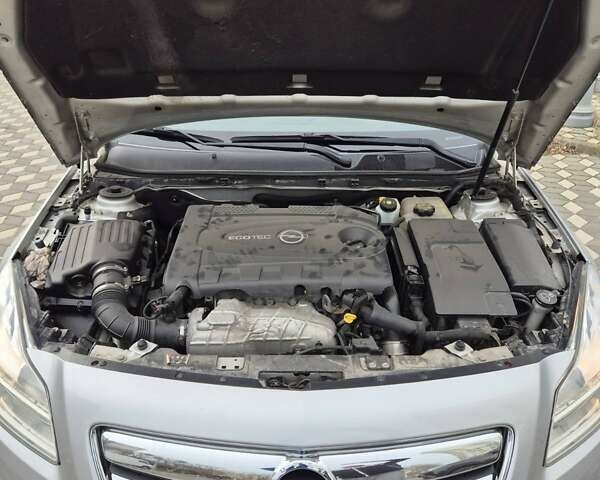 Серый Опель Инсигния, объемом двигателя 1.96 л и пробегом 238 тыс. км за 10700 $, фото 14 на Automoto.ua