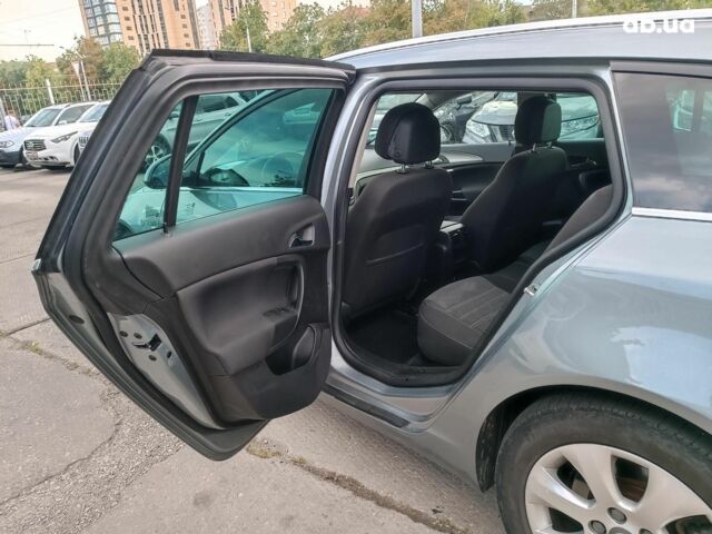 Серый Опель Инсигния, объемом двигателя 2 л и пробегом 288 тыс. км за 8990 $, фото 14 на Automoto.ua