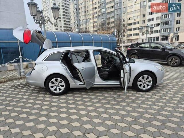 Серый Опель Инсигния, объемом двигателя 1.96 л и пробегом 238 тыс. км за 10700 $, фото 5 на Automoto.ua