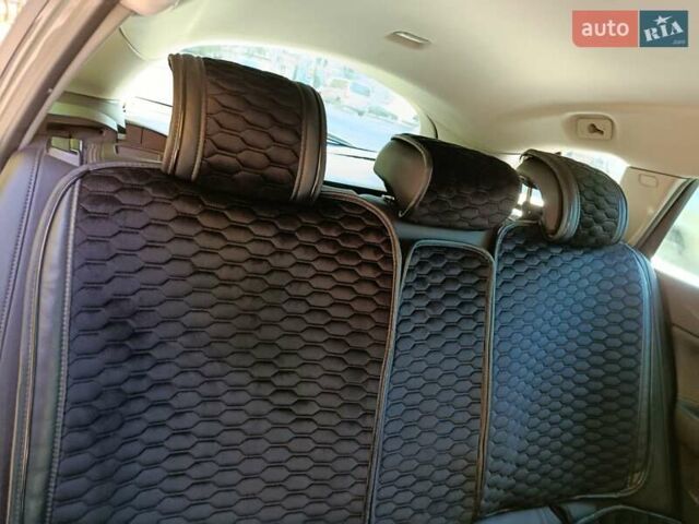 Серый Опель Инсигния, объемом двигателя 1.96 л и пробегом 267 тыс. км за 9300 $, фото 8 на Automoto.ua