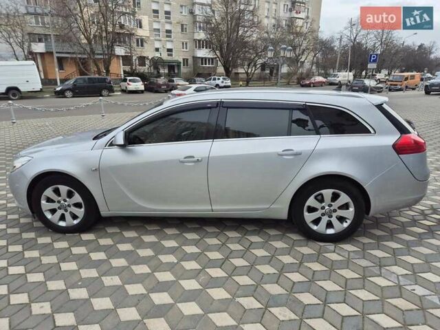 Серый Опель Инсигния, объемом двигателя 1.96 л и пробегом 238 тыс. км за 10700 $, фото 2 на Automoto.ua