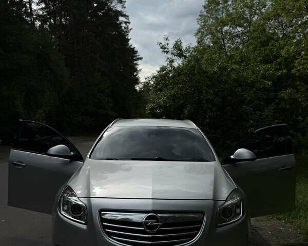 Серый Опель Инсигния, объемом двигателя 1.96 л и пробегом 233 тыс. км за 9500 $, фото 2 на Automoto.ua