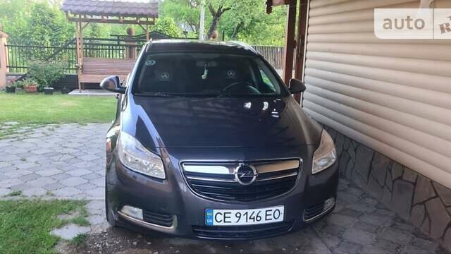 Серый Опель Инсигния, объемом двигателя 1.96 л и пробегом 188 тыс. км за 8000 $, фото 5 на Automoto.ua