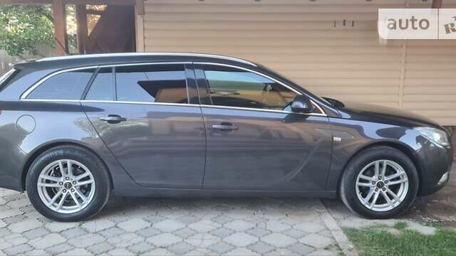 Серый Опель Инсигния, объемом двигателя 1.96 л и пробегом 188 тыс. км за 8000 $, фото 6 на Automoto.ua