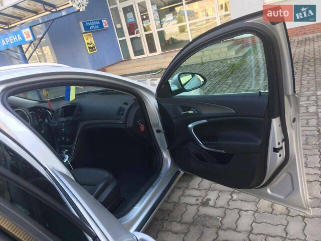 Серый Опель Инсигния, объемом двигателя 1.96 л и пробегом 150 тыс. км за 10550 $, фото 5 на Automoto.ua