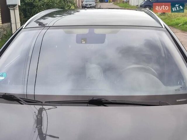 Серый Опель Инсигния, объемом двигателя 1.96 л и пробегом 214 тыс. км за 9200 $, фото 2 на Automoto.ua