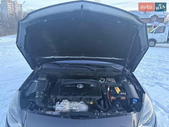 Серый Опель Инсигния, объемом двигателя 1.96 л и пробегом 256 тыс. км за 7500 $, фото 6 на Automoto.ua